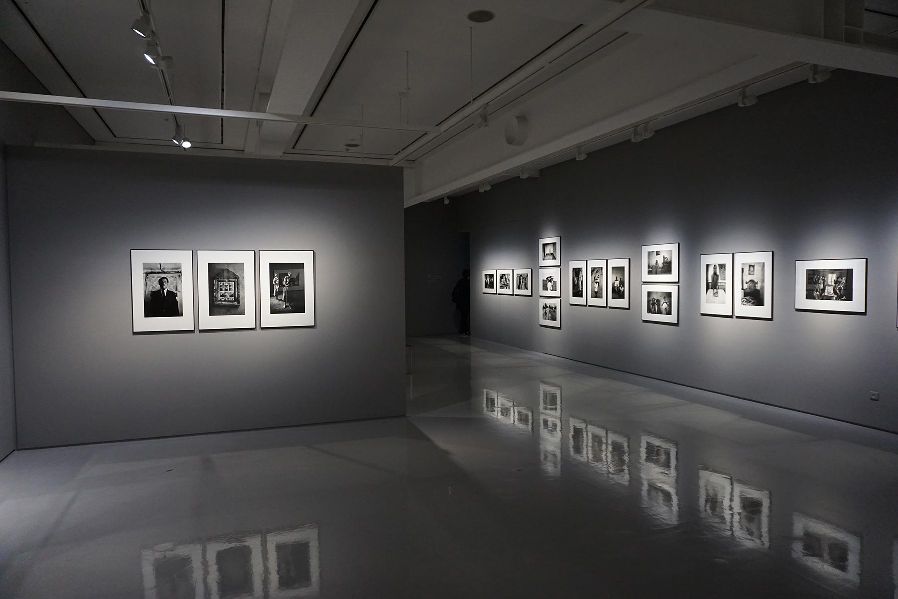 Gallery with photo art in black and white on the walls