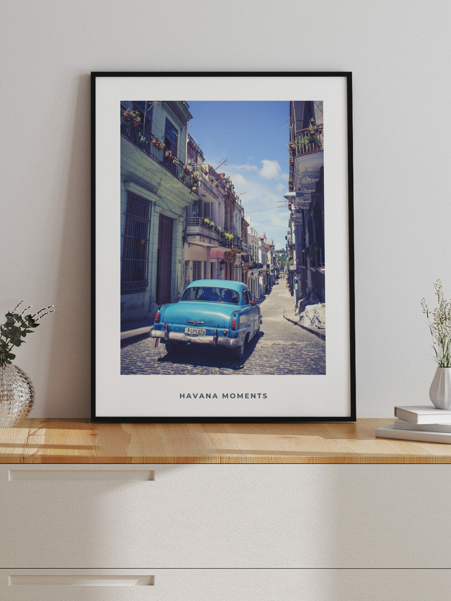 Poster of vintage car driving in old parts of Havana in interior