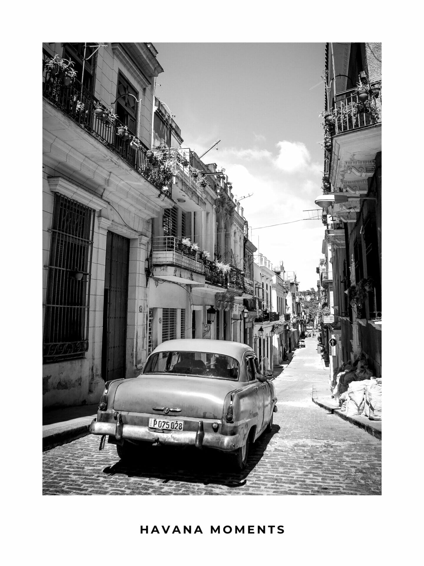 Poster of vintage car driving in old parts of Havana