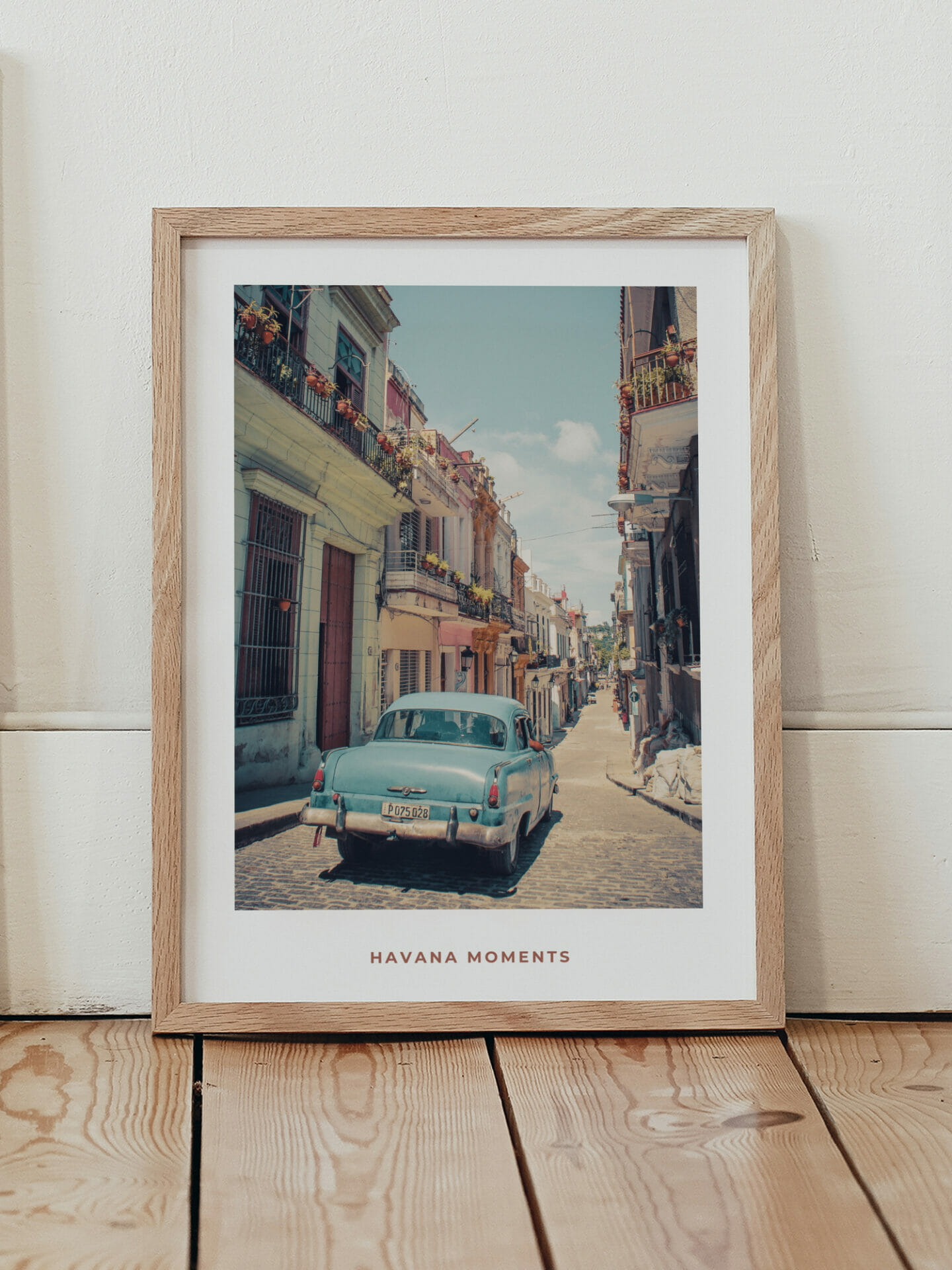 Poster of vintage car driving in old parts of Havana in interior
