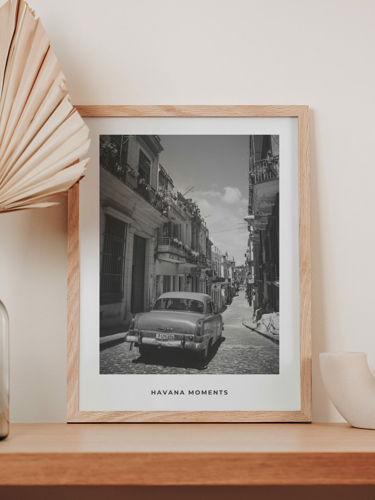 Poster of vintage car driving in old parts of Havana in interior