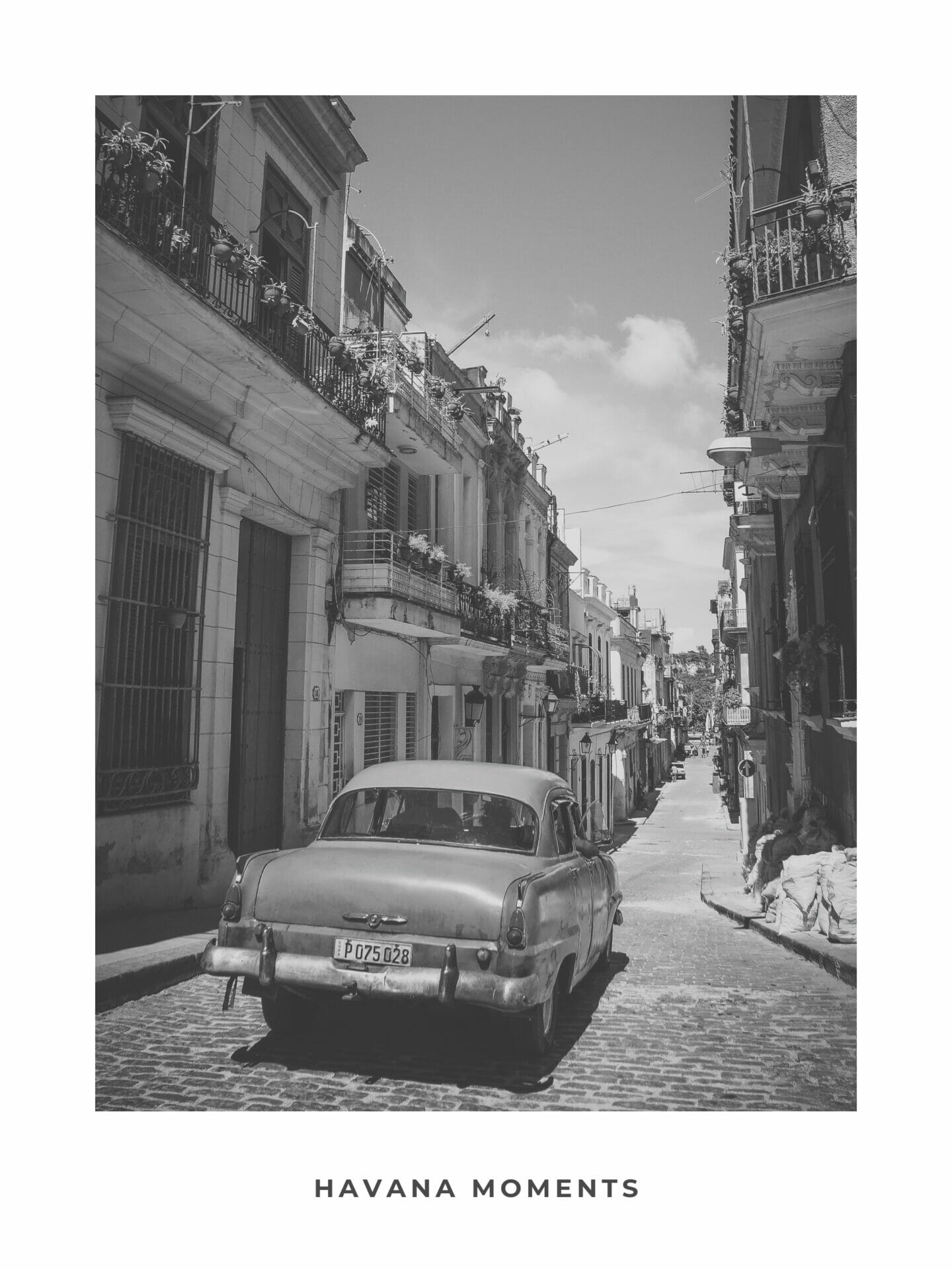 Poster of vintage car driving in old parts of Havana