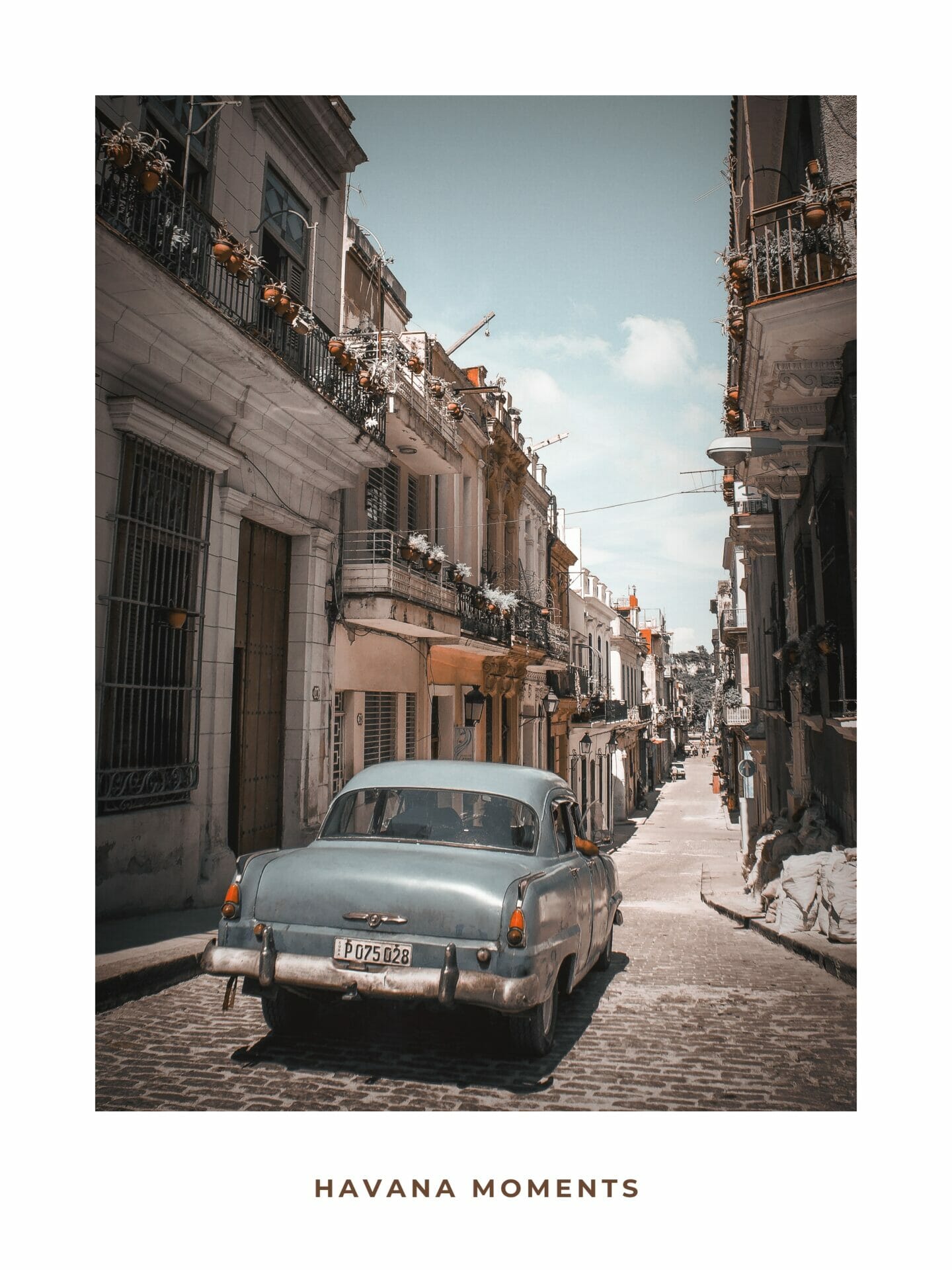 Poster of vintage car driving in old parts of Havana